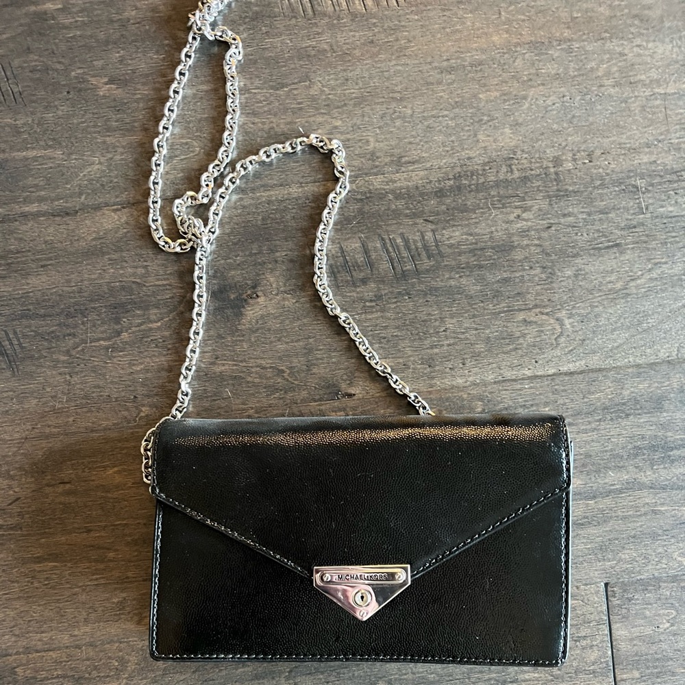 Black clutch. Michael Kors